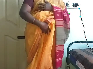 desi  indian lickerish tamil telugu kannada malayalam hindi cheating wife vanitha wearing orange predispose saree  showing big breast added to shaved pussy press hard breast press nip fretting pussy masturbation